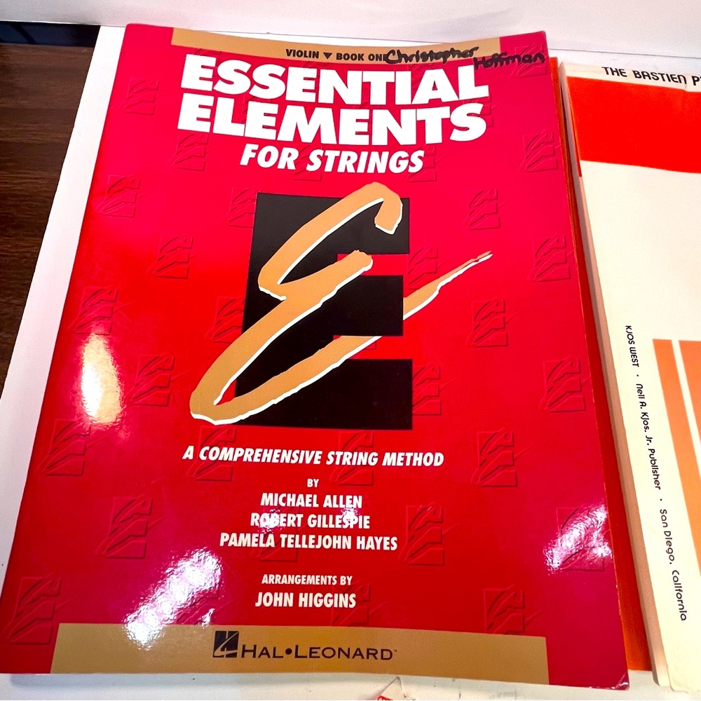 2 Essential Elements Violin  books with 1 DVD not used